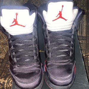 Air Jordan 5 Retro (GS) Black/University Boys size 4y worn once. Good condition.